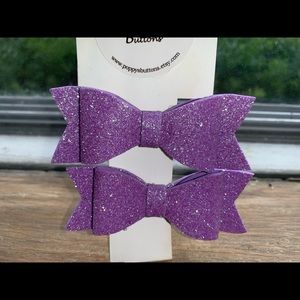 Pair of purple hair bows